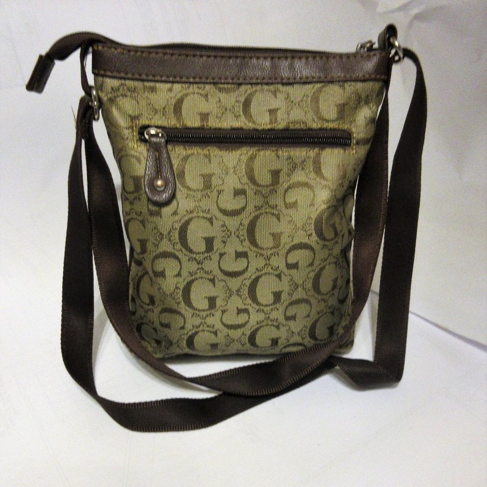 Crossover Purse WIth The G  Letter /Animal Print  all Over It.